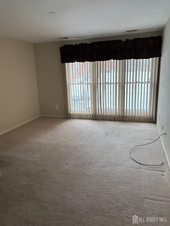 a view of a livingroom with a large window