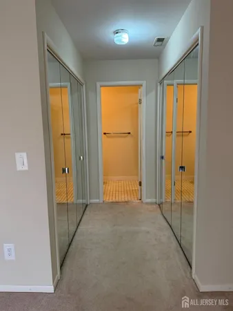 a view of empty room with front door