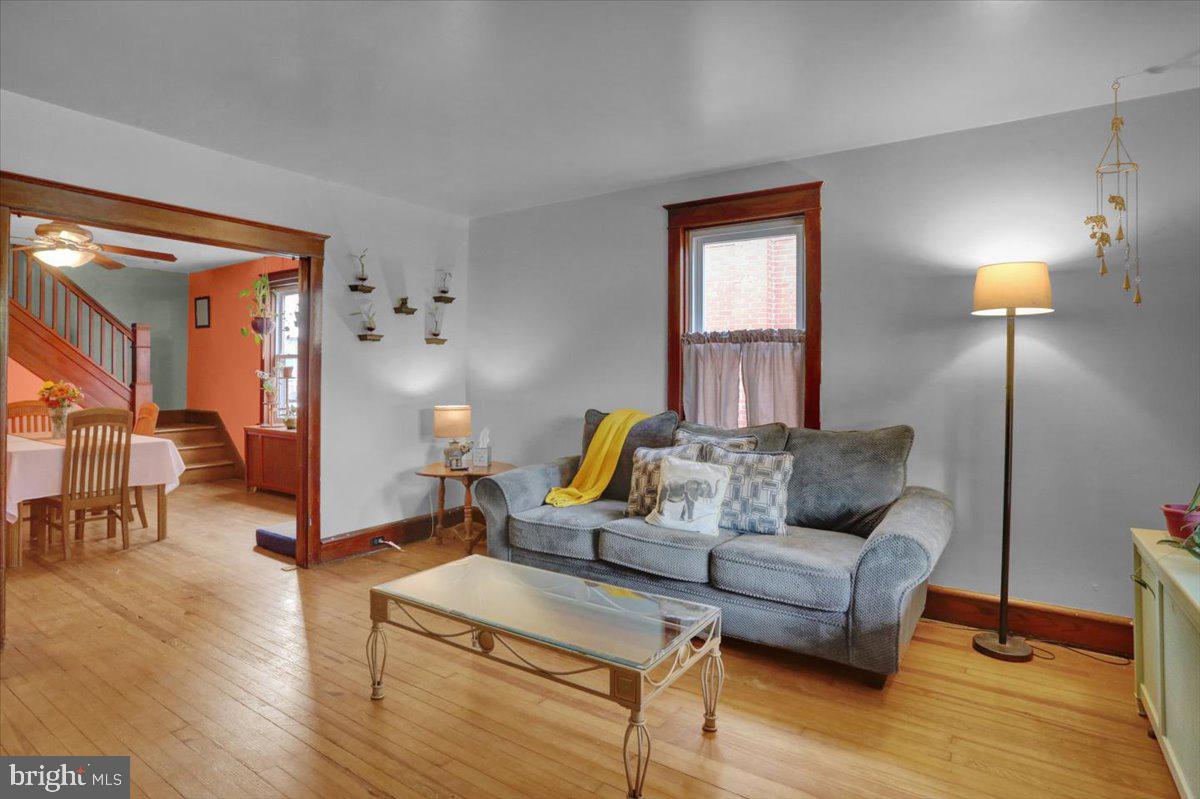 136 West Elm Street Reading, PA 19607 - Photo 4 of 23 a living room with furniture and wooden floor