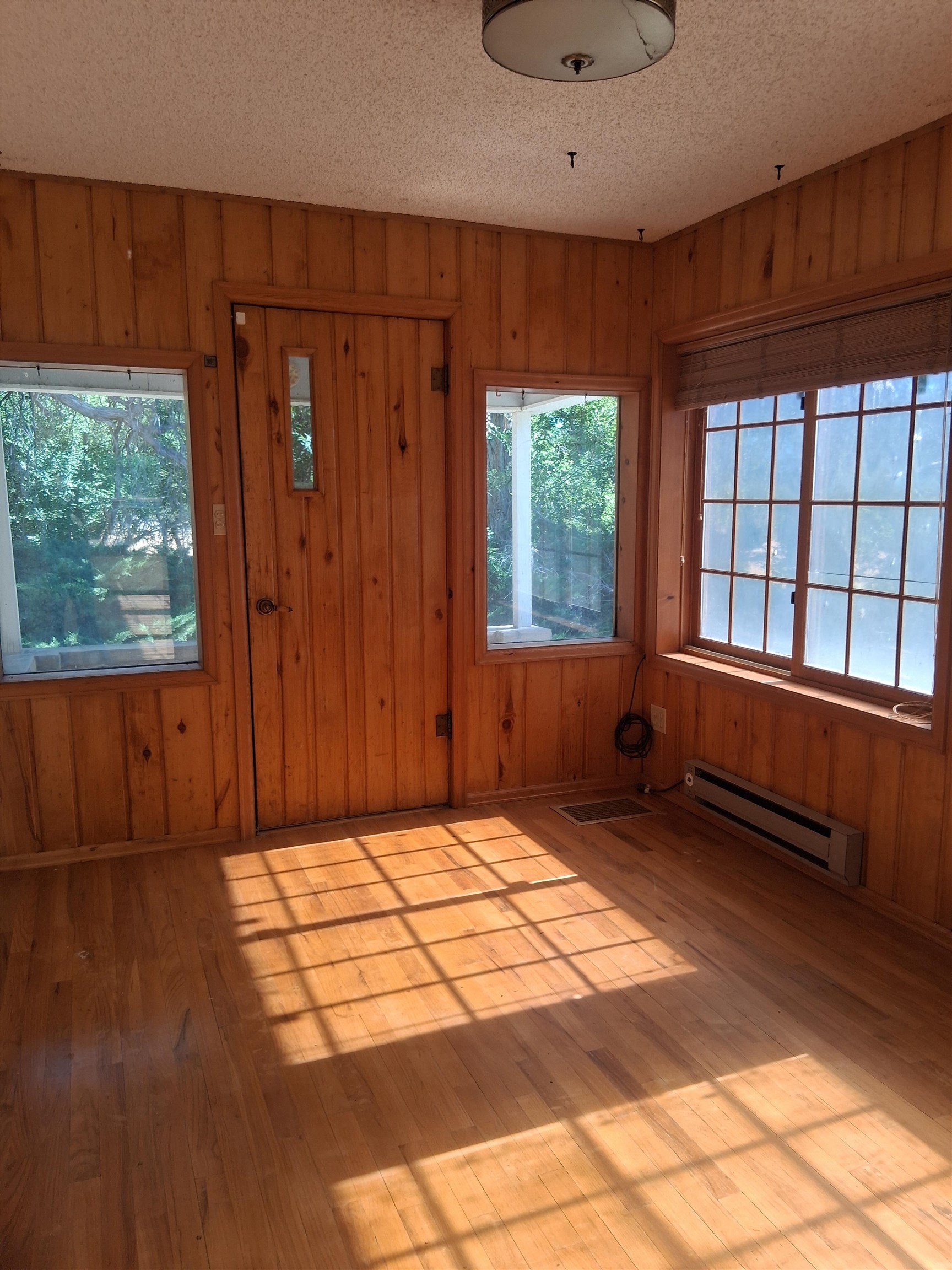 1983 River Road Fruita, CO 81521 - Photo 22 of 31 a view of a room with a window and wooden floor