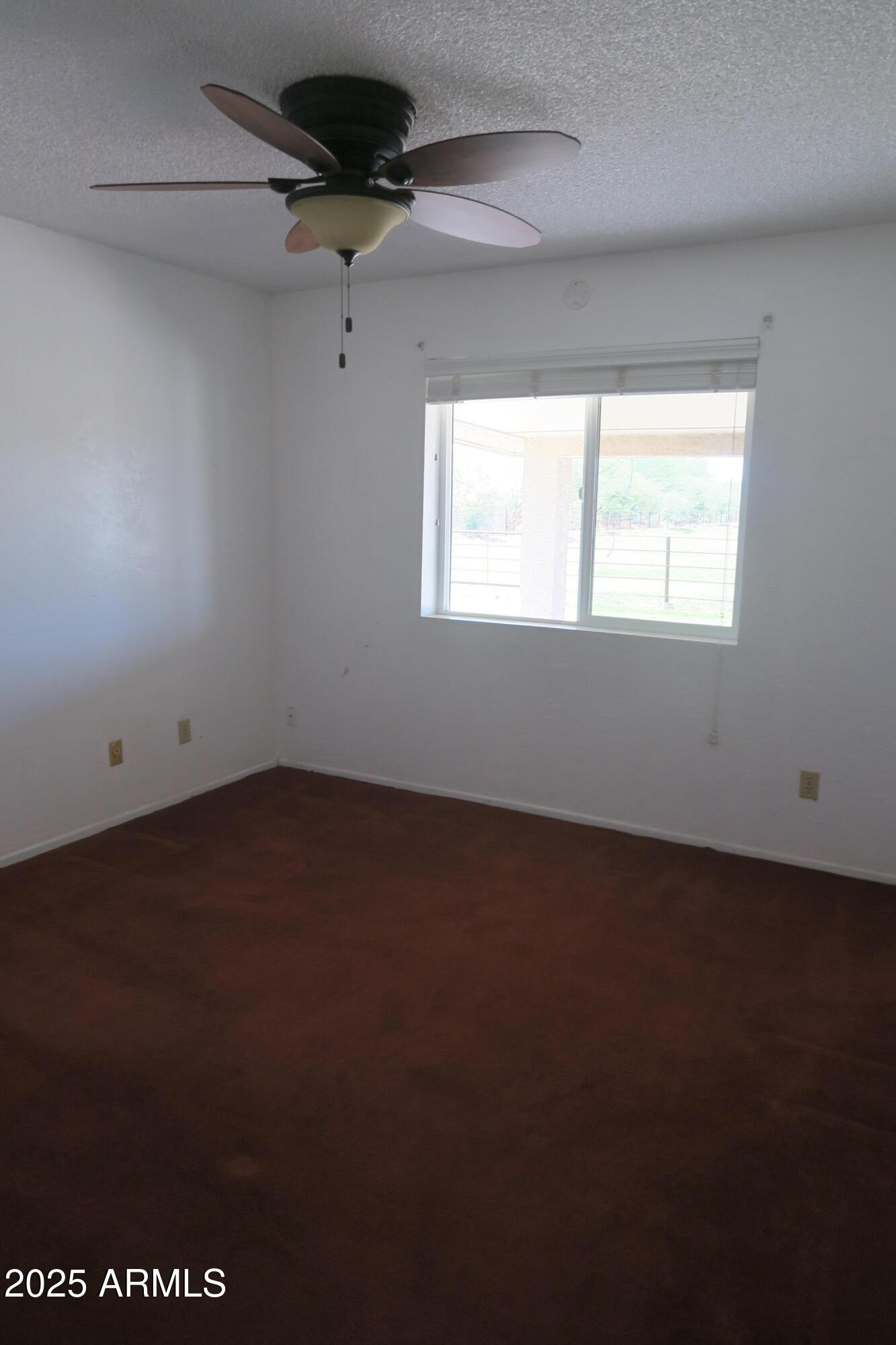 9208 South Palo Verde Road Buckeye, AZ 85326 - Photo 23 of 27 a view of a room with an empty space