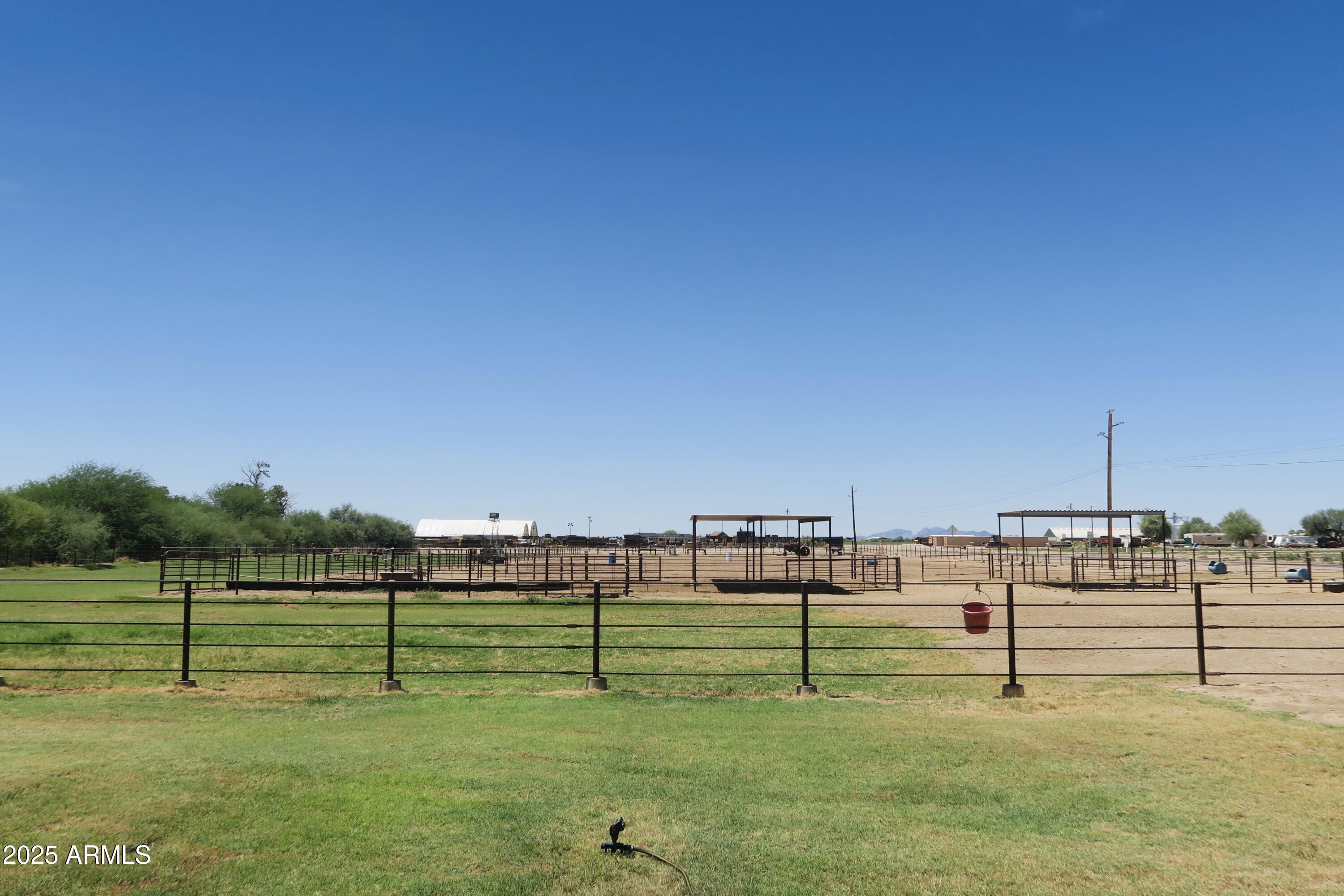 9208 South Palo Verde Road Buckeye, AZ 85326 - Photo 8 of 27 a view of a bench in a park