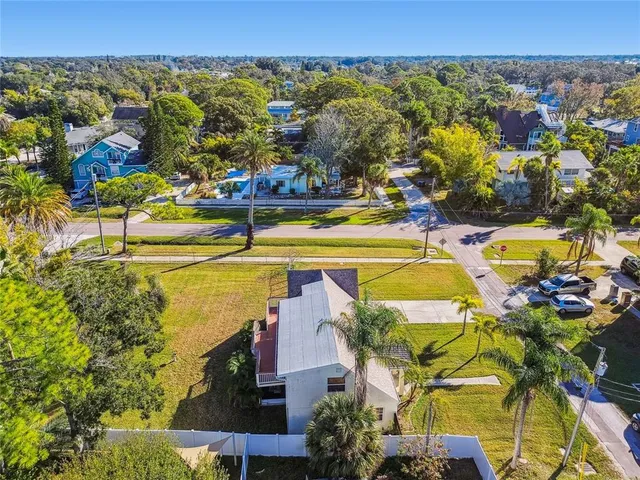a view of a swimming pool with an outdoor space and seating area
