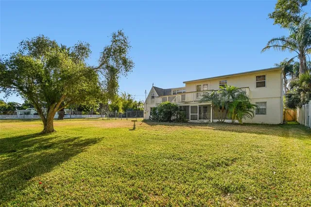 a view of a swimming pool and an outdoor space