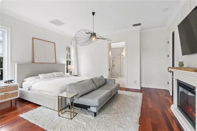 a bedroom with a bed and a cabinets