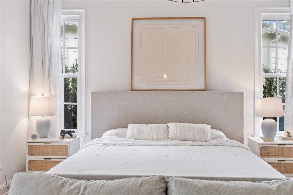 222 Acadia Terrace Celebration, FL 34747 - Photo 24 of 76 a bedroom with a bed and a window