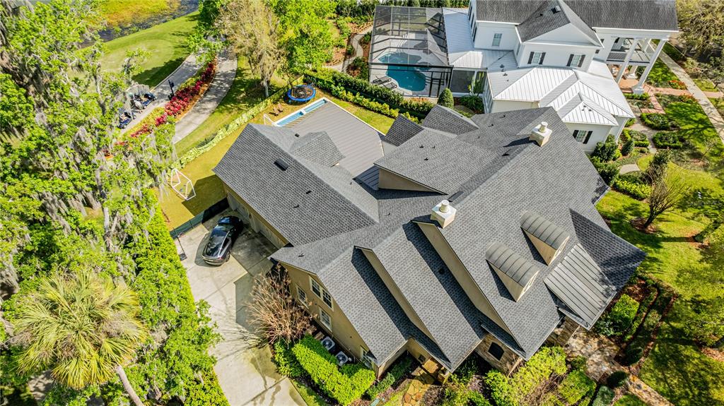 222 Acadia Terrace Celebration, FL 34747 - Photo 69 of 76 an aerial view of a house with garden space and street view