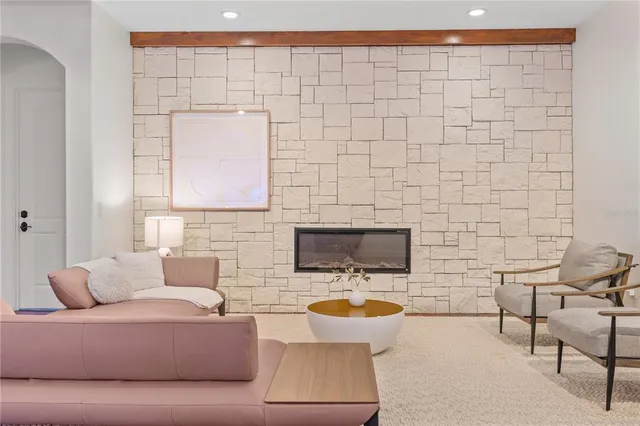 a kitchen with a sink a stove and cabinets with wooden floor