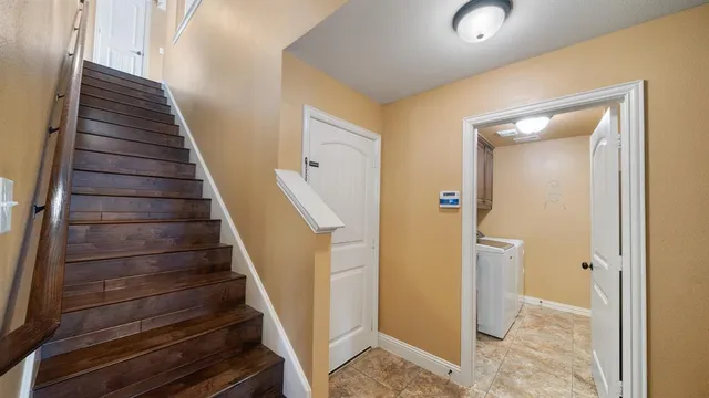 a view of an entryway with staircase