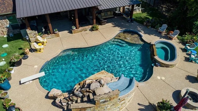a view of a patio in backyard