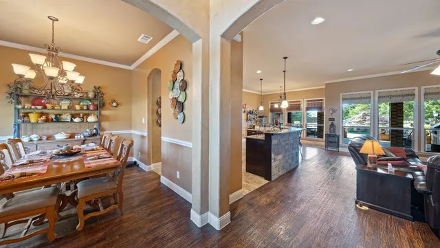 a view of a kitchen and dining room
