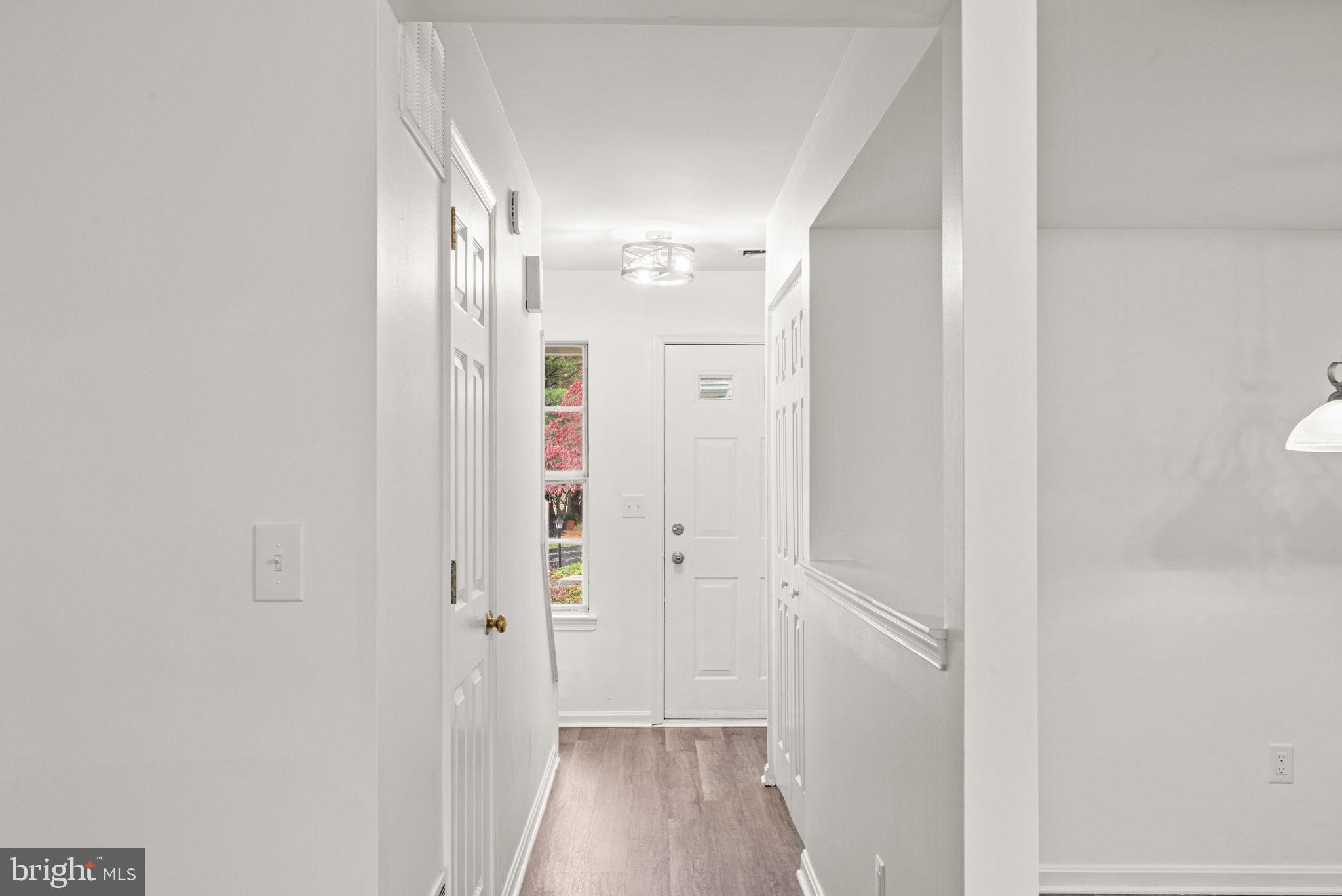 2006 Wexford Road Palmyra, PA 17078 - Photo 4 of 36 a view of a hallway with wooden floor and closet area
