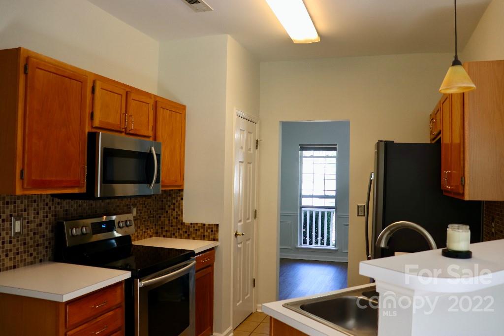 723 West Cheval Drive Fort Mill, SC 29708 - Photo 5 of 14 a kitchen with a sink stove and microwave