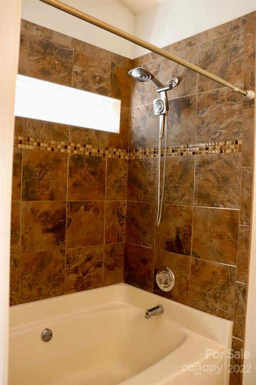 723 West Cheval Drive Fort Mill, SC 29708 - Photo 9 of 14 a bathroom with a sink and a shower
