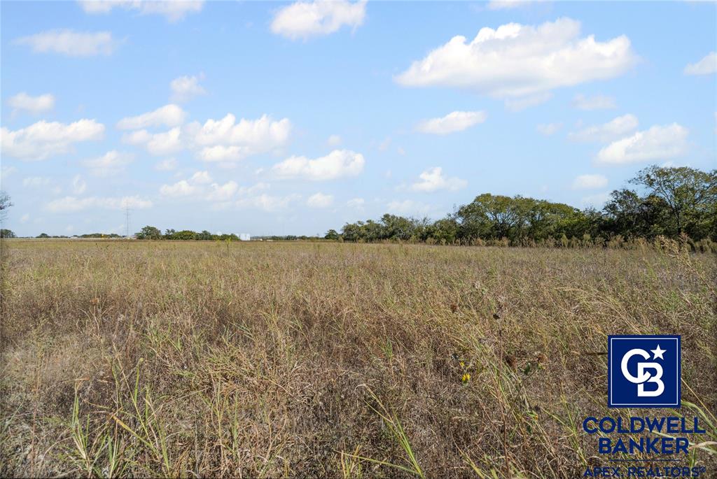 501 Hix Road Cleburne, TX 76031 - Photo 6 of 12 a view of a lake with houses in the back