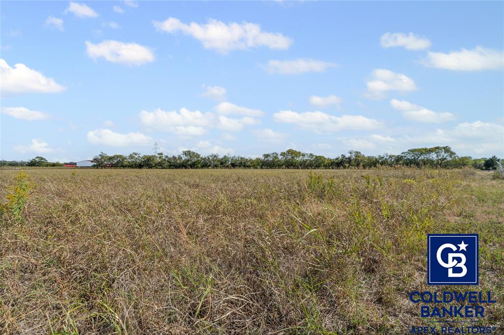 501 Hix Road Cleburne, TX 76031 - Photo 8 of 12 a view of a lake with houses in the back