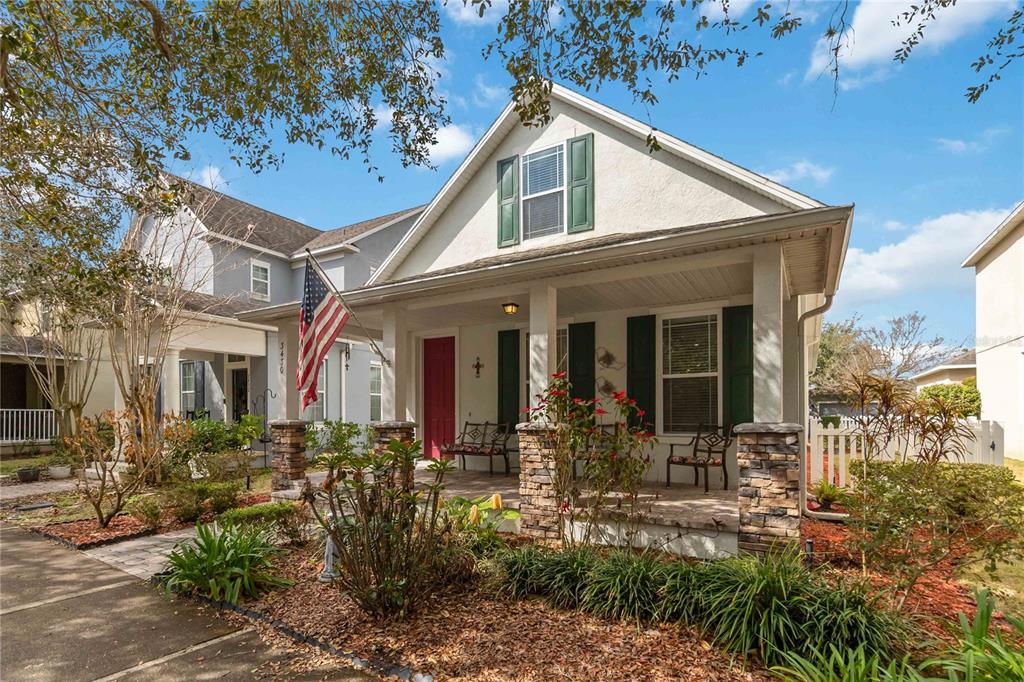 3430 Schoolhouse Road Harmony, FL 34773 - Photo 3 of 70 a front view of a house with a porch