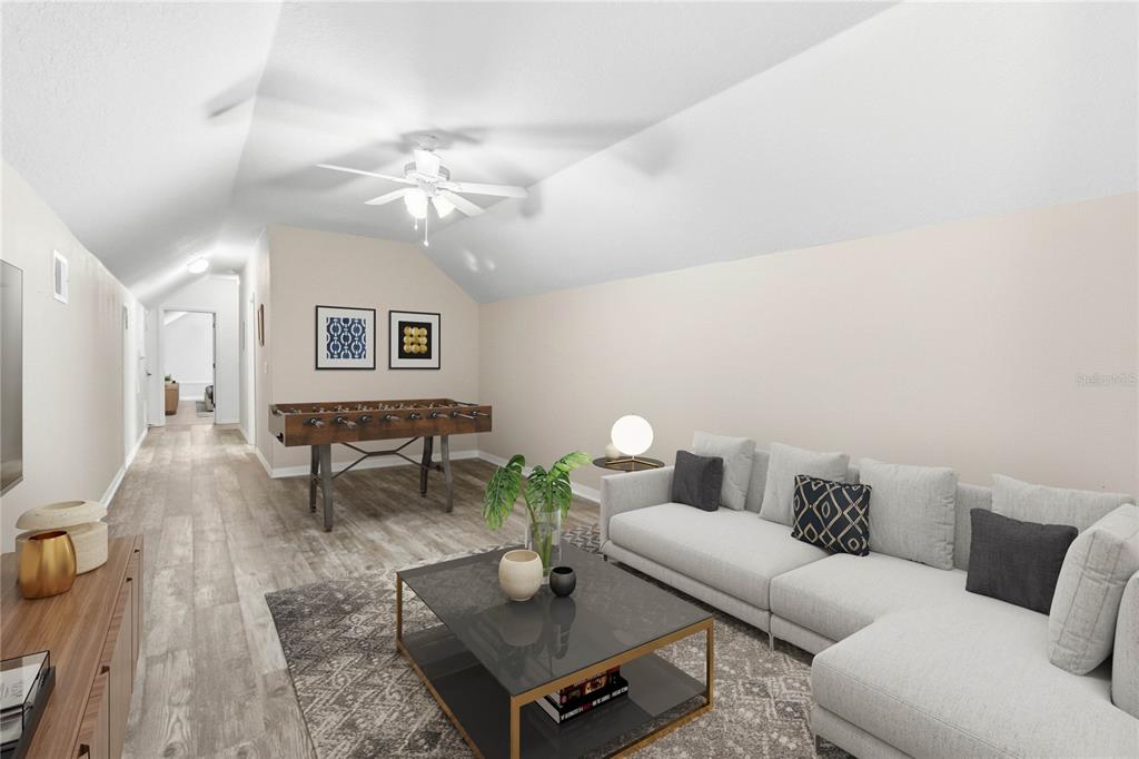 3430 Schoolhouse Road Harmony, FL 34773 - Photo 37 of 70 a living room with furniture