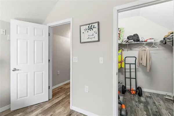 an aerial view of a residential apartment building with a yard