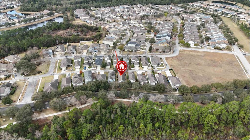 3430 Schoolhouse Road Harmony, FL 34773 - Photo 60 of 70 an aerial view of multiple house