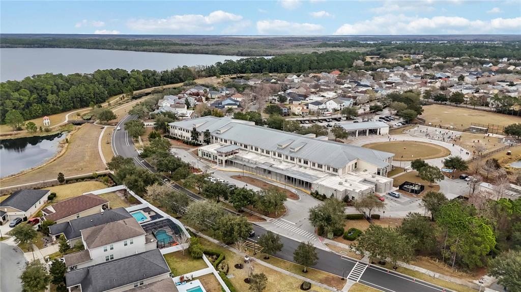 3430 Schoolhouse Road Harmony, FL 34773 - Photo 62 of 70 an aerial view of a city with lots of residential buildings