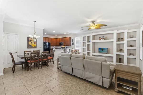 a kitchen with stainless steel appliances granite countertop a stove sink and microwave