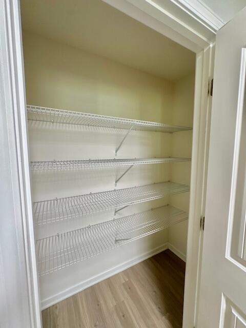 348 Merlin Court Crestview, FL 32539 - Photo 10 of 40 a view of a room with racks on the wall