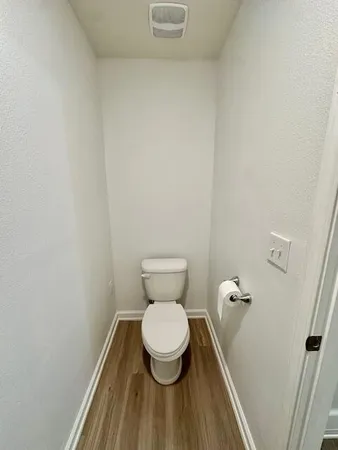 a white bath tub and shower