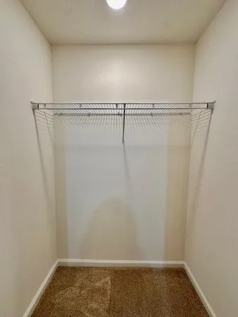 a view of a room with racks on the wall