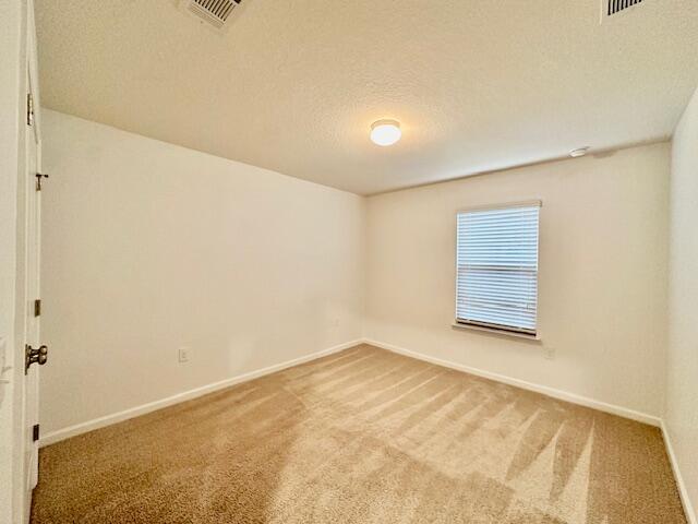348 Merlin Court Crestview, FL 32539 - Photo 27 of 40 an empty room with windows