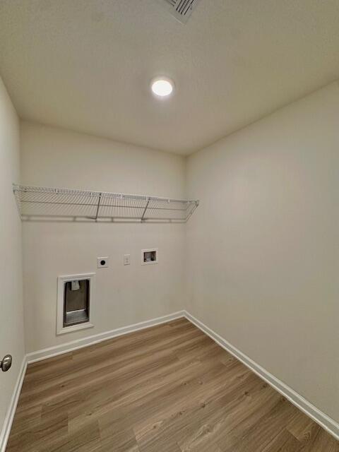 348 Merlin Court Crestview, FL 32539 - Photo 29 of 40 a view of empty room with wooden floor