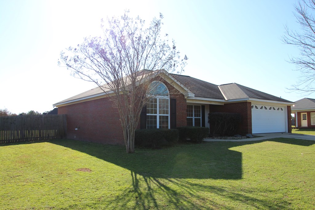 13 Moore Road Fort Mitchell, AL 36856 - Photo 26 of 37 a front view of a house with a yard