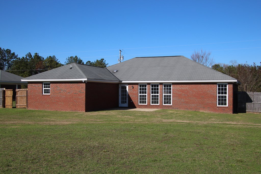 13 Moore Road Fort Mitchell, AL 36856 - Photo 28 of 37 a front view of a house with a garden