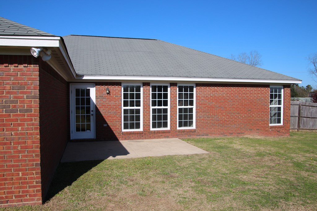 13 Moore Road Fort Mitchell, AL 36856 - Photo 32 of 37 a front view of a house with a yard