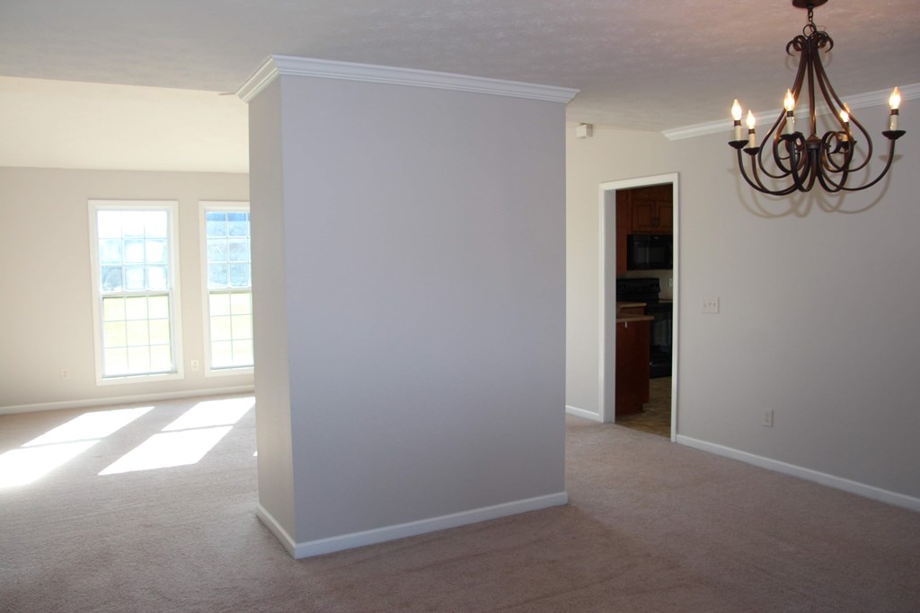 13 Moore Road Fort Mitchell, AL 36856 - Photo 5 of 37 an empty room with windows and entrance