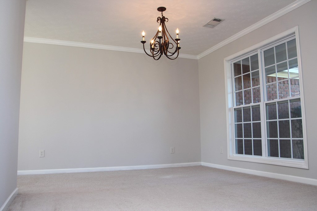 13 Moore Road Fort Mitchell, AL 36856 - Photo 6 of 37 an empty room with windows