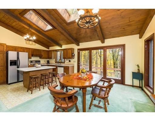 50 Deer Bay Road Ashby, MA 01431 - Photo 15 of 40 a dining room with furniture and a floor to ceiling window