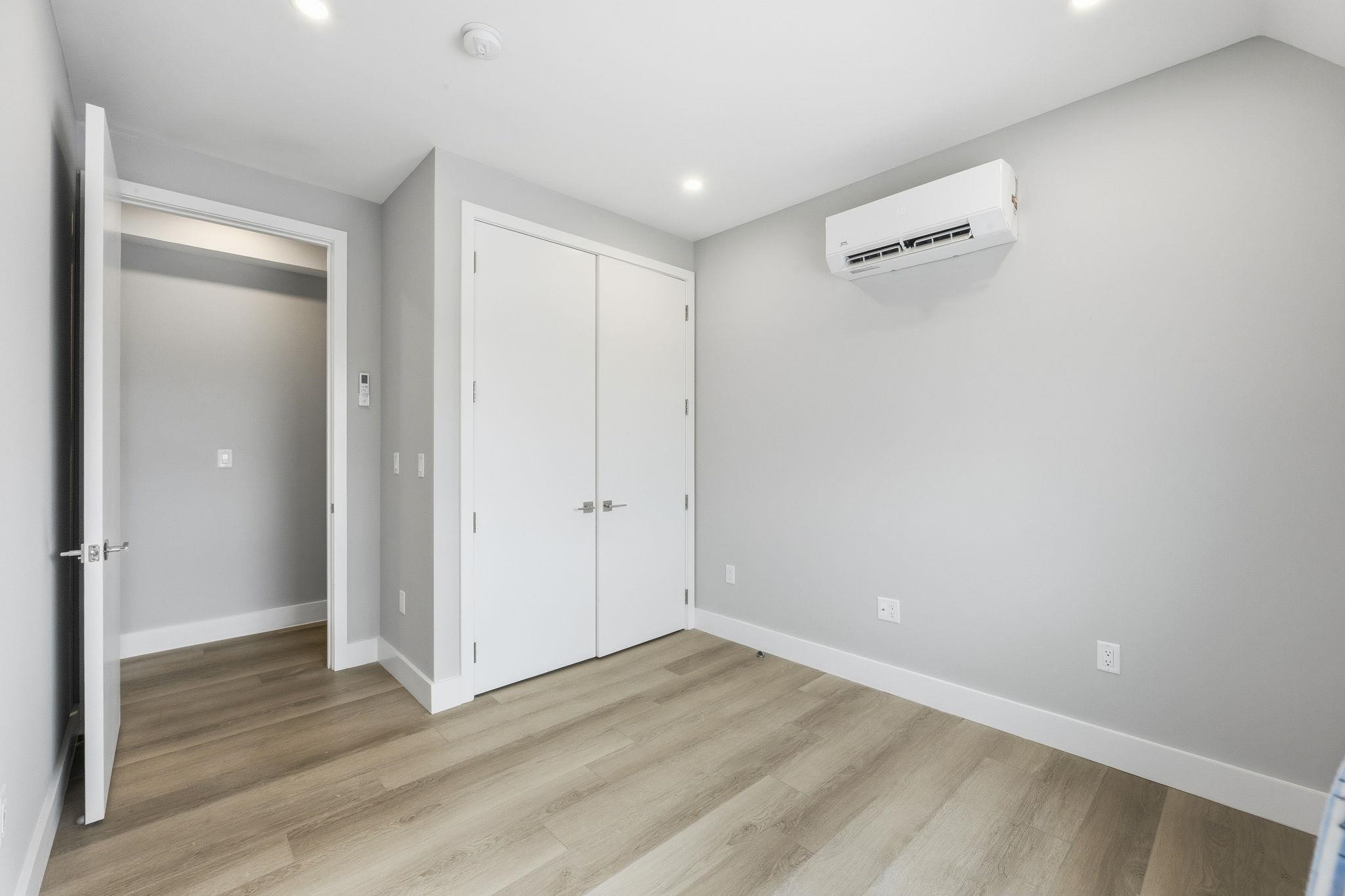 77 Van Reypen Street, Unit 4 Jersey City, NJ 07306 - Photo 12 of 23 a view of an empty room