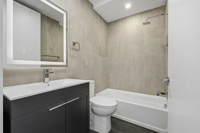 a view of a livingroom with wooden floor