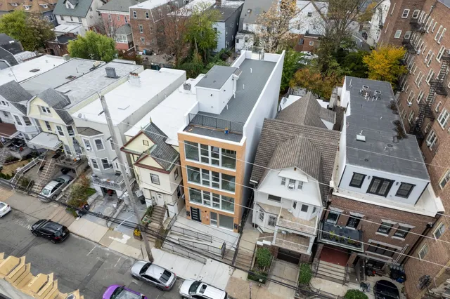 an aerial view of a city with lots of residential buildings