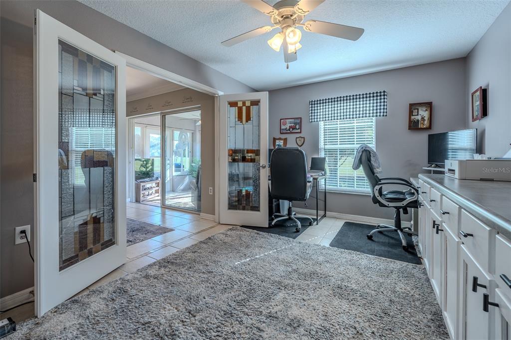 15143 Southwest 14th Avenue Road Ocala, FL 34473 - Photo 32 of 53 a view of a livingroom with workspace and a window