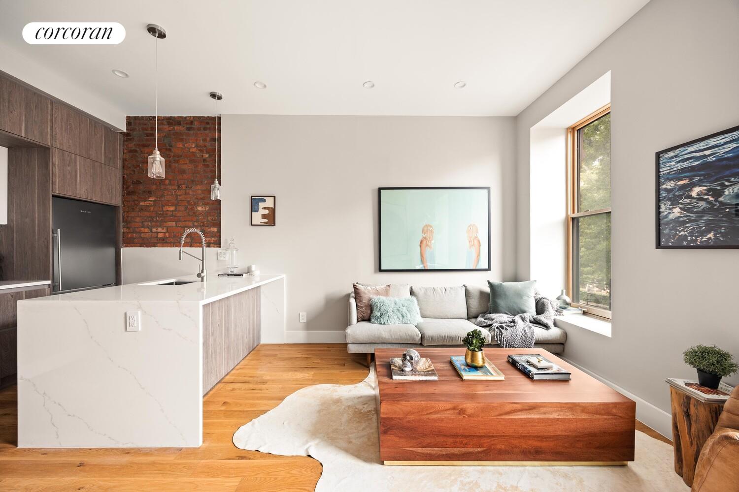 503 Clinton Avenue, Unit 4A Brooklyn, NY 11238 - Photo 1 of 9 a living room with furniture and a rug