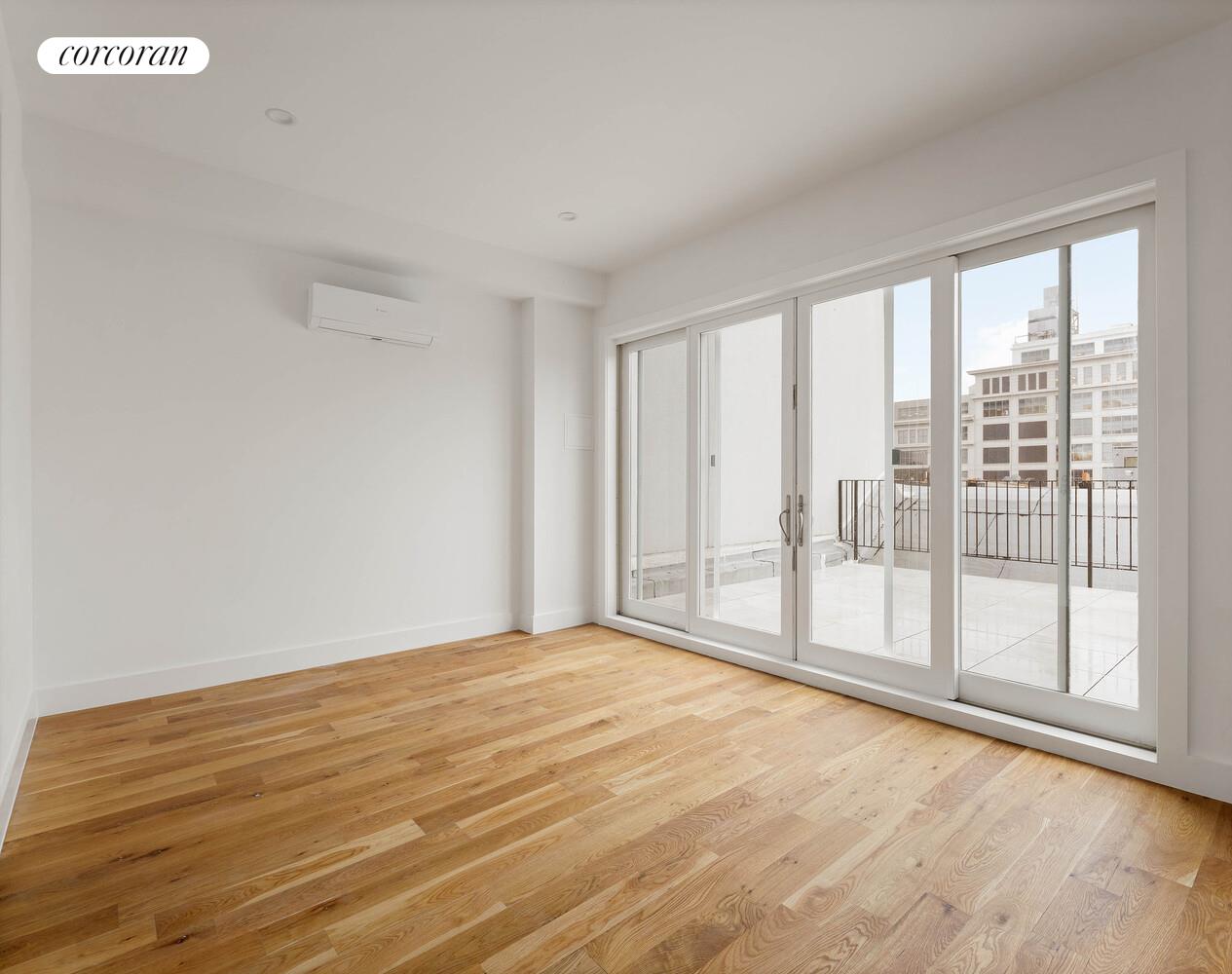 503 Clinton Avenue, Unit 4A Brooklyn, NY 11238 - Photo 6 of 9 a view of an empty room with glass door
