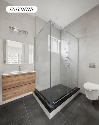 a view of an empty room with glass door