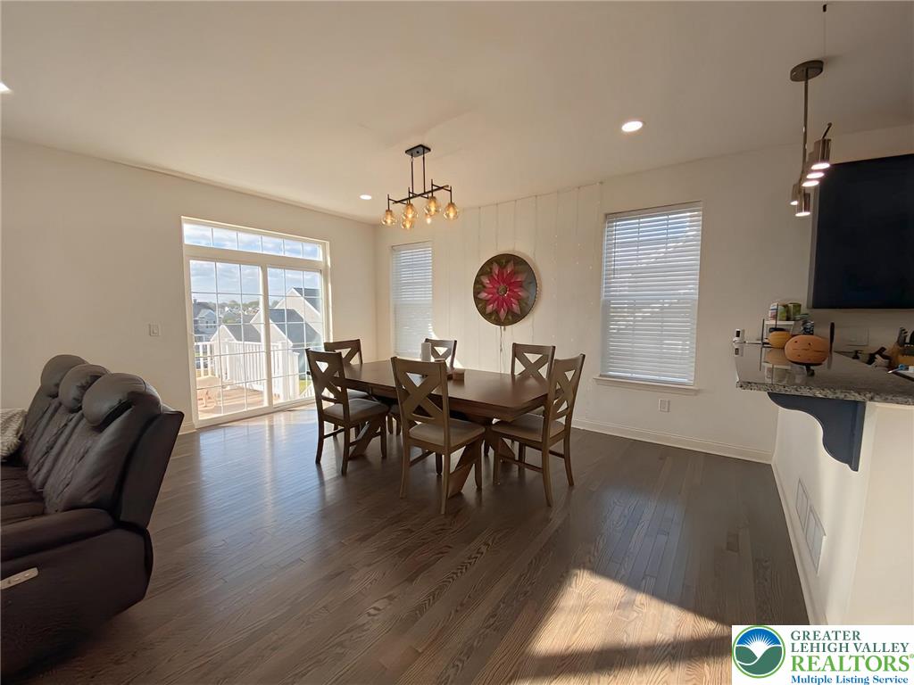 477 Newlins Road East Easton, PA 18040 - Photo 12 of 51 a view of a dining room with furniture window and wooden floor