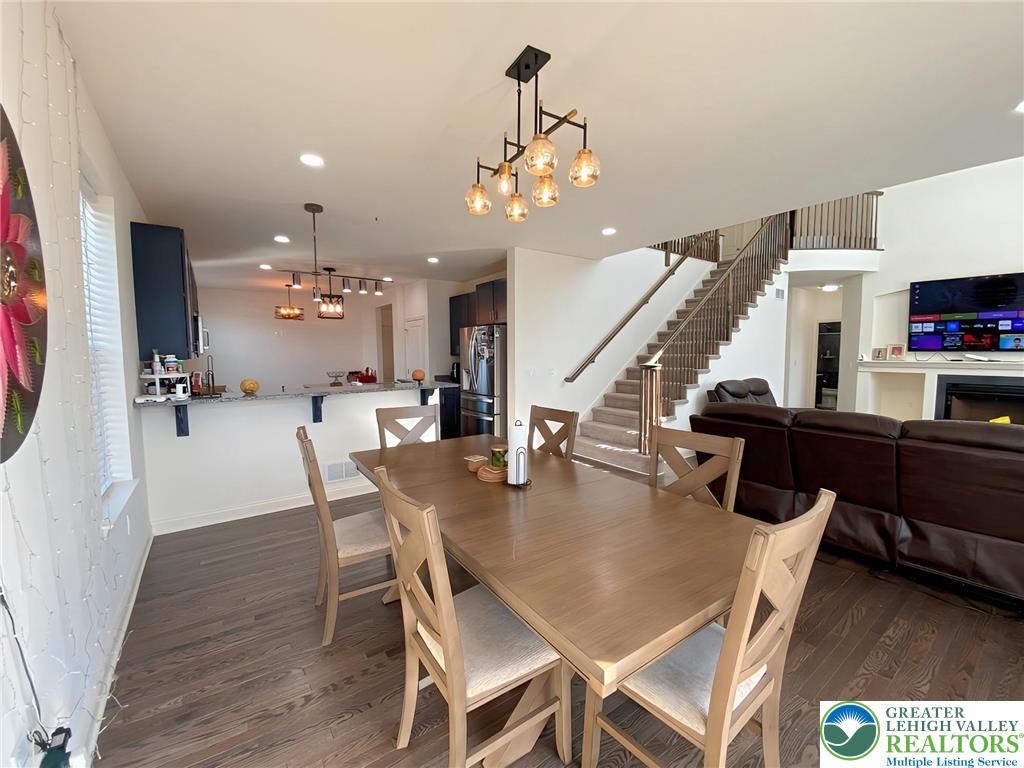 477 Newlins Road East Easton, PA 18040 - Photo 17 of 51 a view of a dining room with furniture and wooden floor
