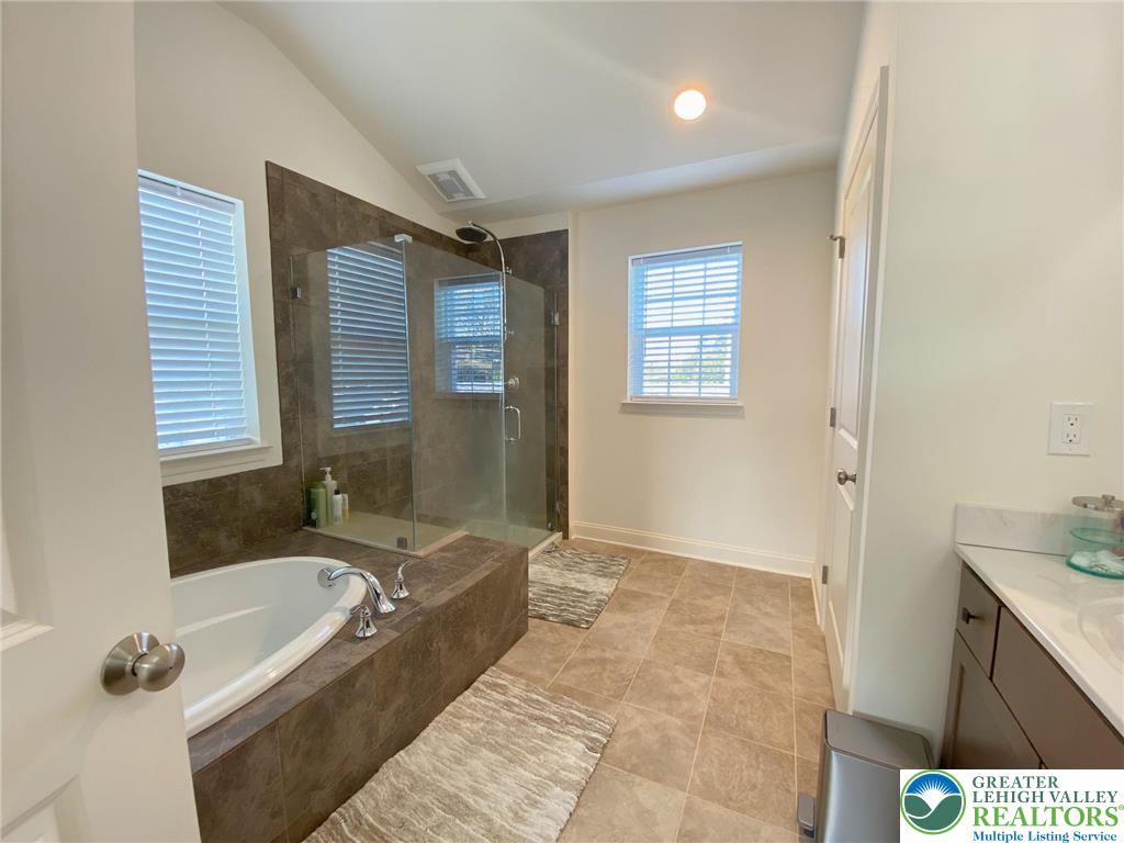477 Newlins Road East Easton, PA 18040 - Photo 30 of 51 a bathroom with a granite countertop tub sink and mirror