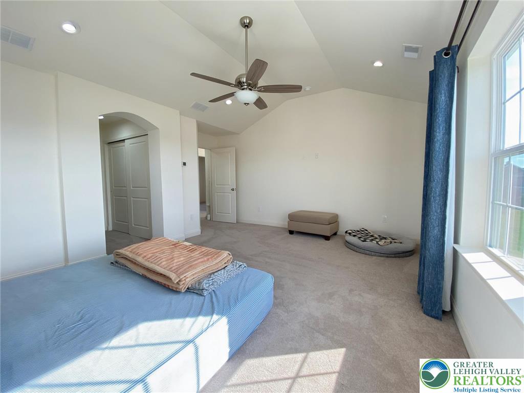 477 Newlins Road East Easton, PA 18040 - Photo 35 of 51 a living room with furniture and a chandelier