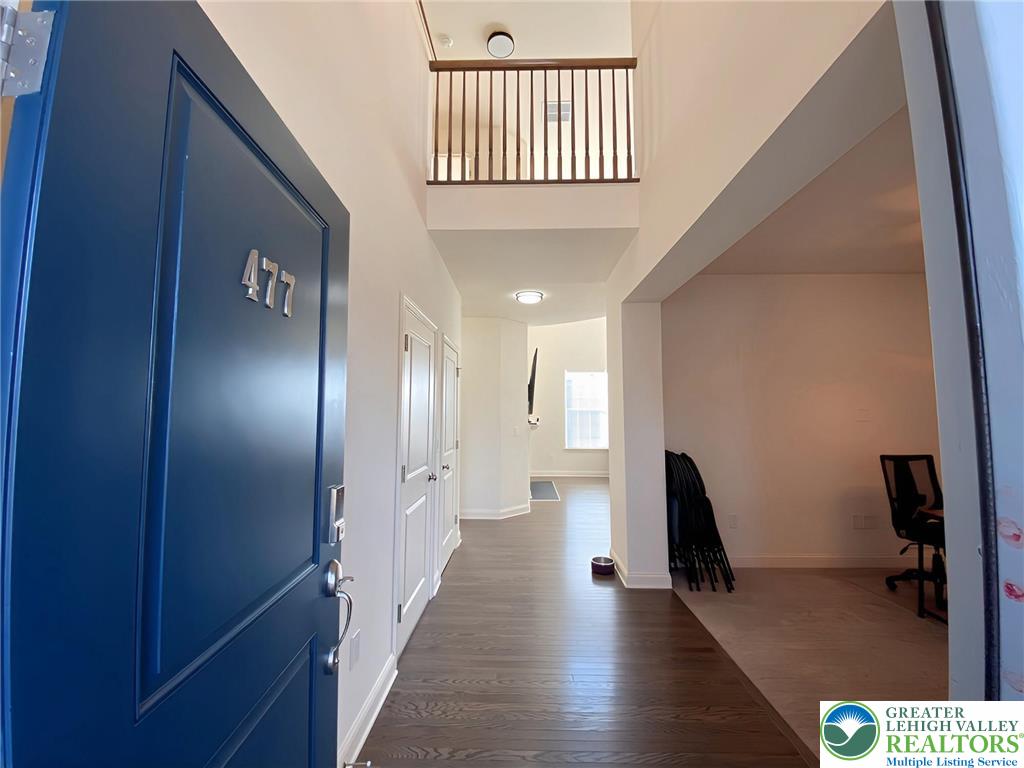 477 Newlins Road East Easton, PA 18040 - Photo 4 of 51 a view of hallway with stairs and wooden floor