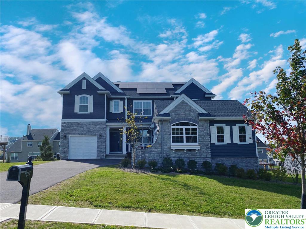 477 Newlins Road East Easton, PA 18040 - Photo 51 of 51 a front view of a house with a garden
